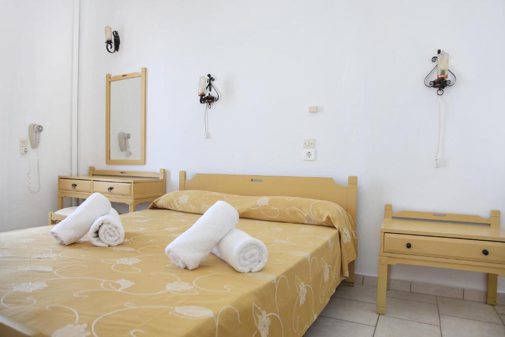 Postel nebo postele na pokoji v ubytování Asterias Hotel - Seafront