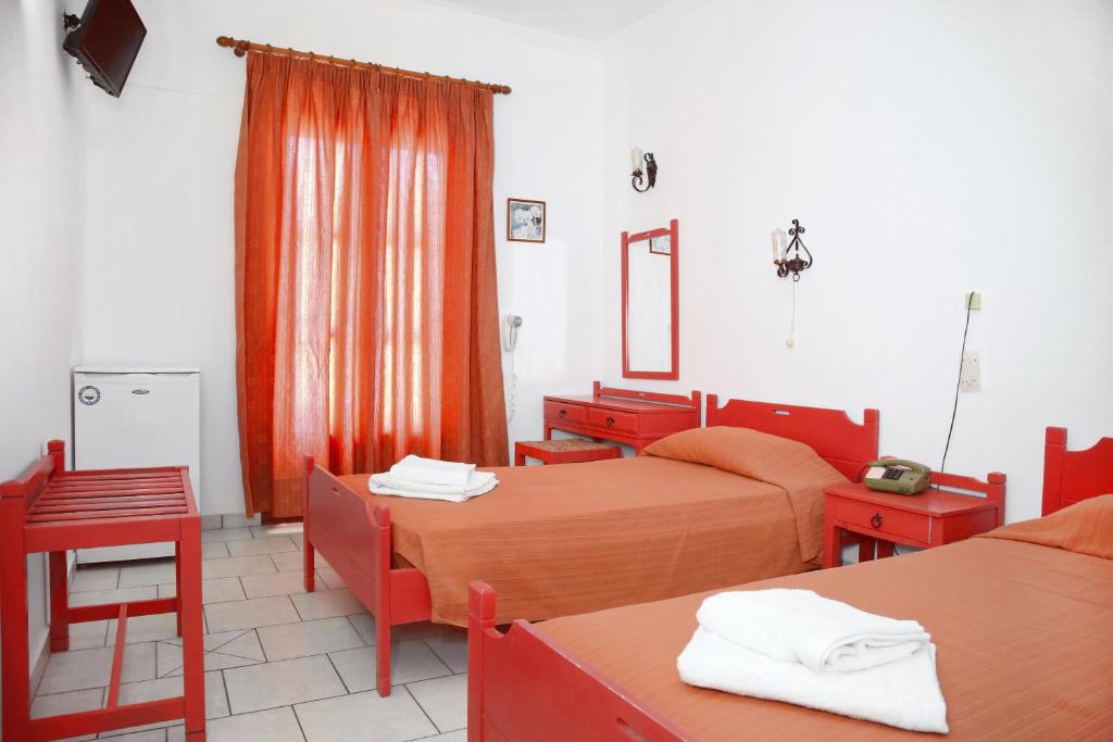 Postel nebo postele na pokoji v ubytování Asterias Hotel - Seafront