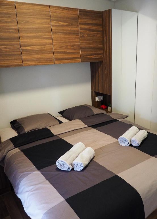 Postel nebo postele na pokoji v ubytování Lux camp - mobile homes in Bi village