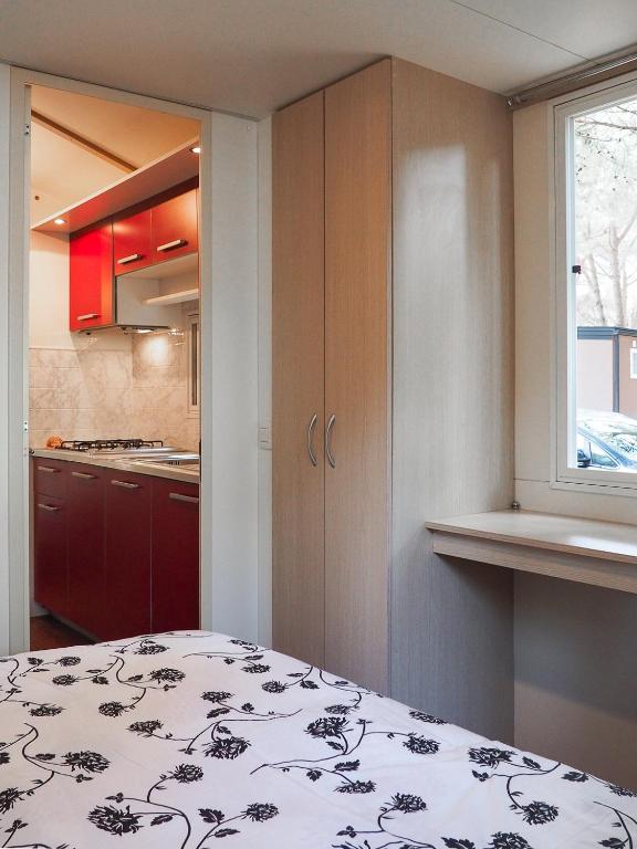 Postel nebo postele na pokoji v ubytování Lux camp - mobile homes in Bi village
