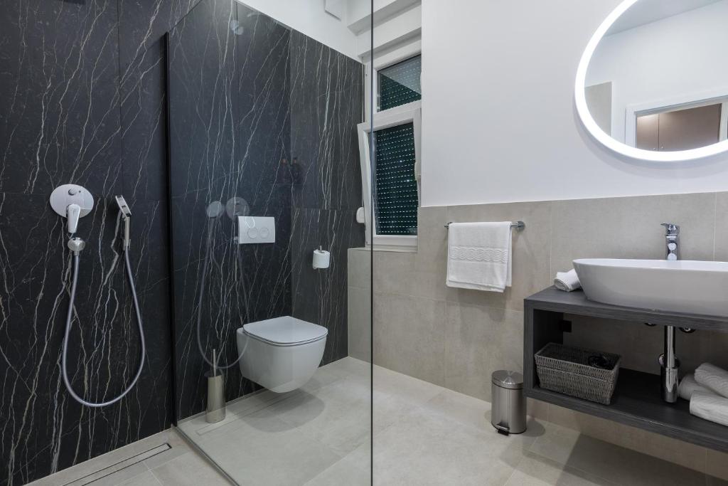 Koupelna v ubytování Green Park Luxury Rooms