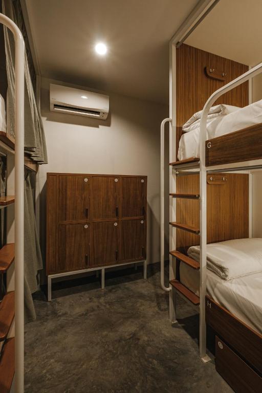 Postel nebo postele na pokoji v ubytování Hidden Garden Hostel