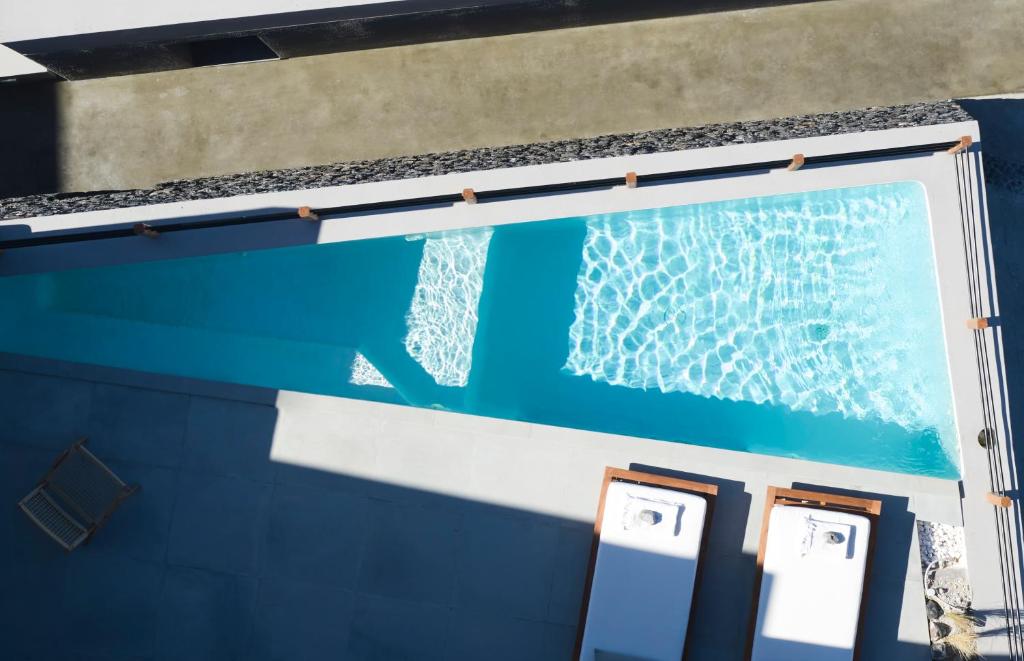 Bazén v ubytování Melidonia Suites nebo v jeho okolí