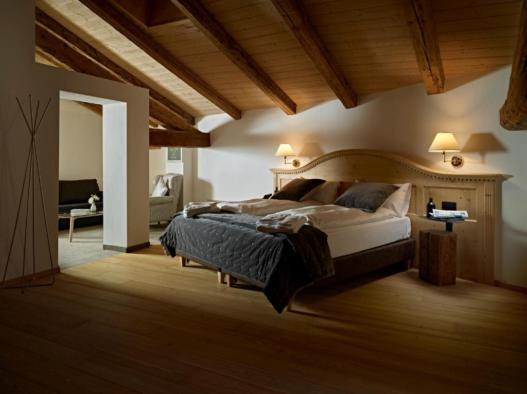 Postel nebo postele na pokoji v ubytování Romantic Hotel Excelsior