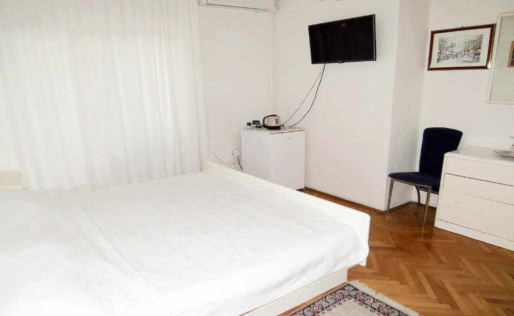 Postel nebo postele na pokoji v ubytování Rooms N&M