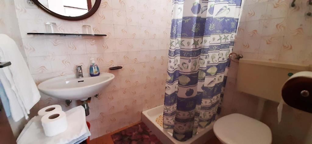 Koupelna v ubytování Rooms N&M