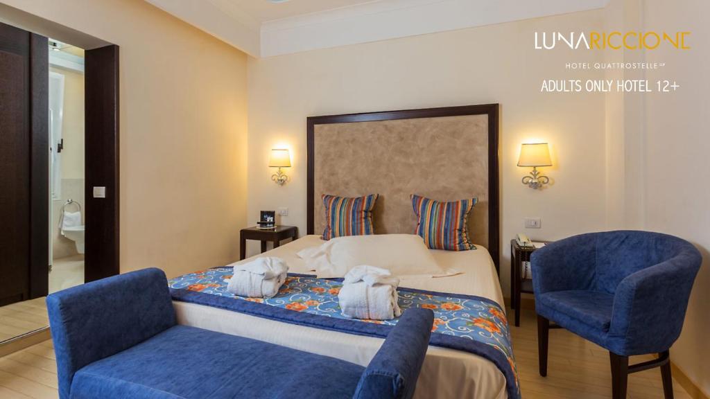 Postel nebo postele na pokoji v ubytování Hotel Luna Riccione e Aqua Spa Only Adults +12