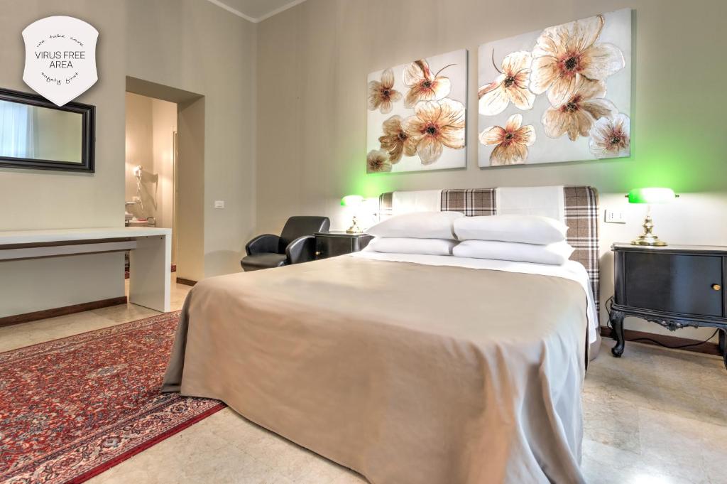 Cama o camas de una habitación en Ramé Suites