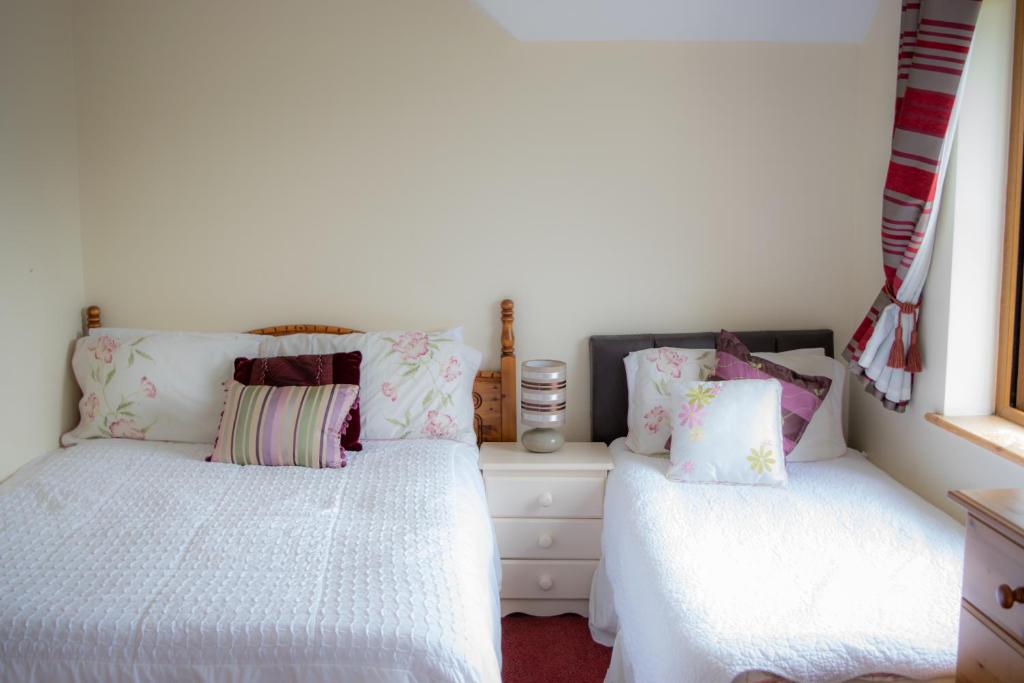 Giường trong phòng chung tại no 6 Cnoc Na Si