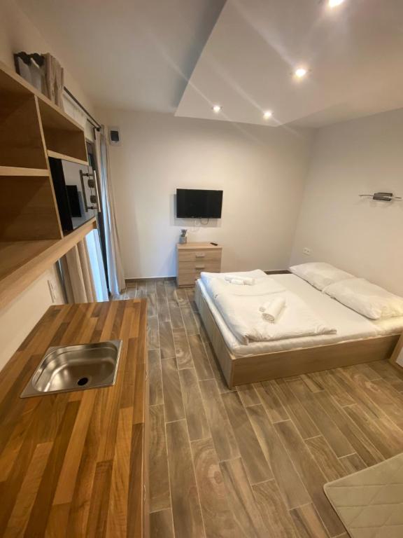 Posteľ alebo postele v izbe v ubytovaní Silver Relax Siófok