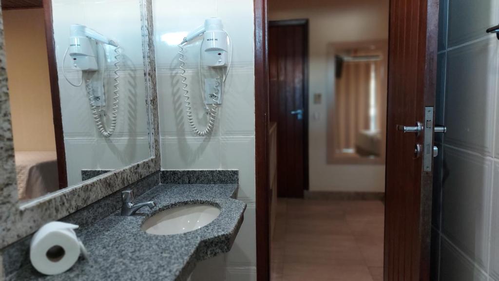 Koupelna v ubytování Porto Bali Hotel