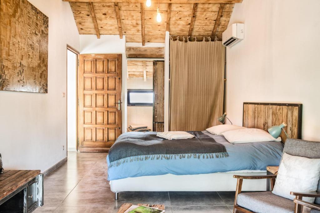 Postel nebo postele na pokoji v ubytování Mas de Bouvet en Camargue