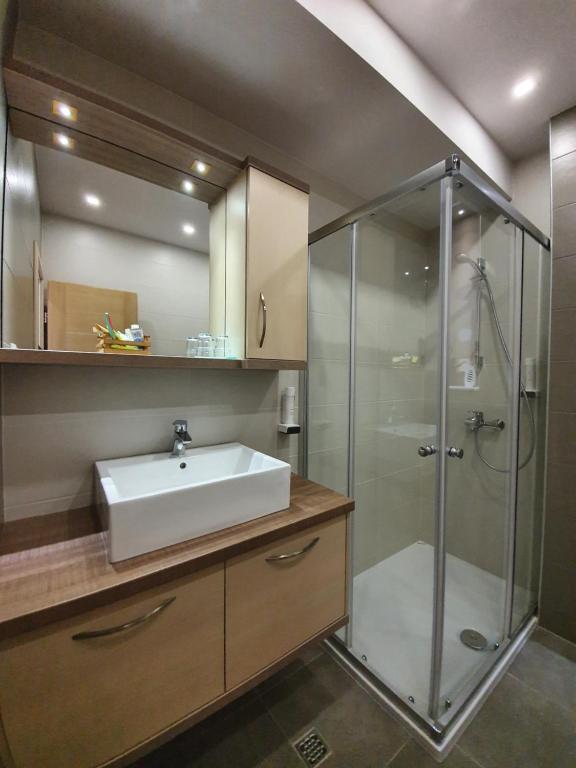 Koupelna v ubytování Apartments Hermes