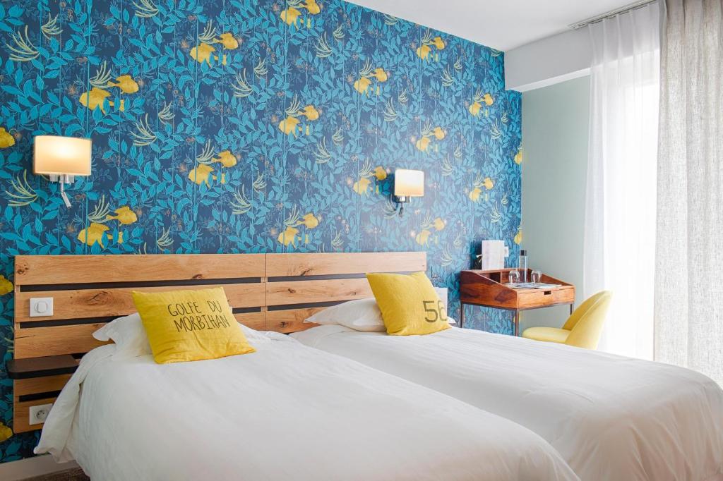 Postel nebo postele na pokoji v ubytování Hotêl & Spa Du Parc Fétan