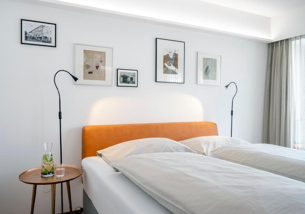 Postel nebo postele na pokoji v ubytování Boutique Hotel Hauser