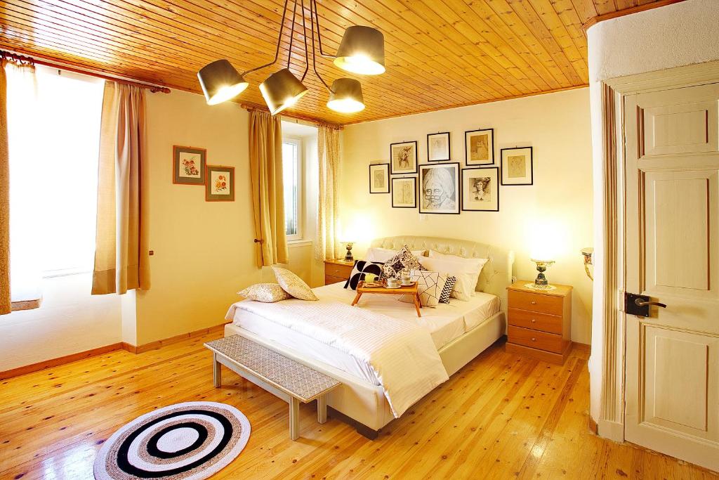 Posteľ alebo postele v izbe v ubytovaní Nona's House