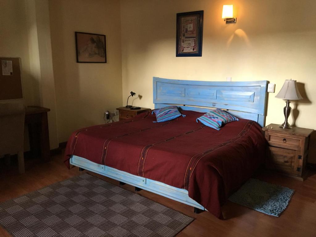 Postel nebo postele na pokoji v ubytování Kukurutz Residencia