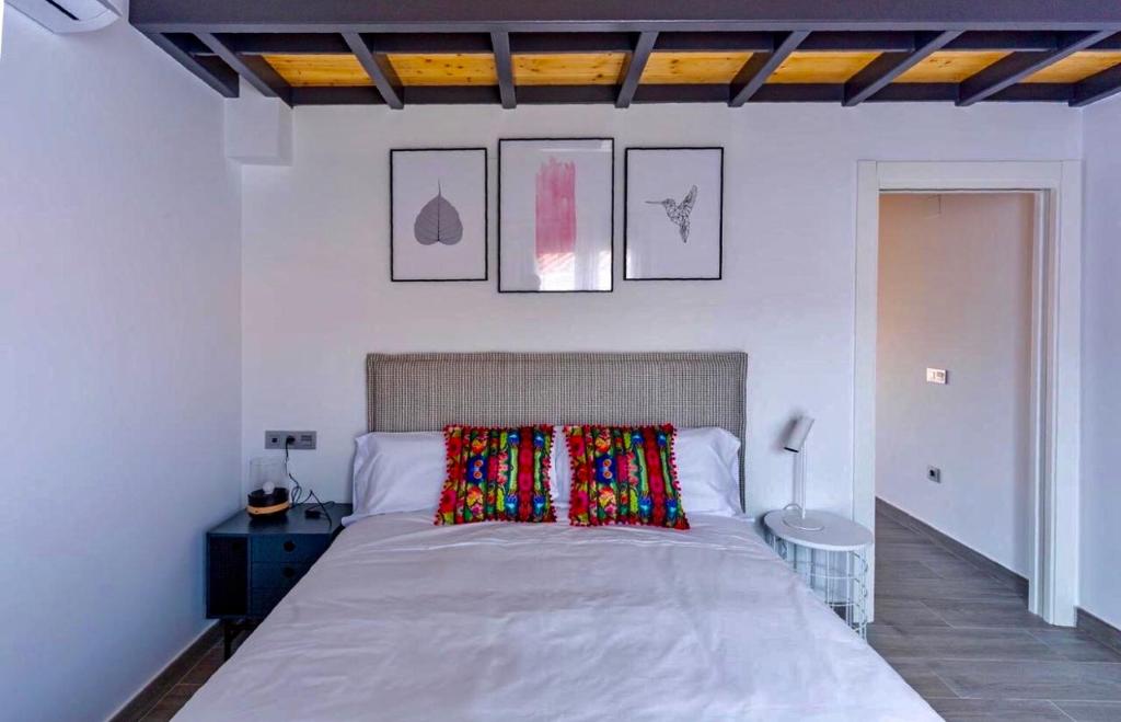 Postel nebo postele na pokoji v ubytování Apartamentos Turísticos Huerto El Horno