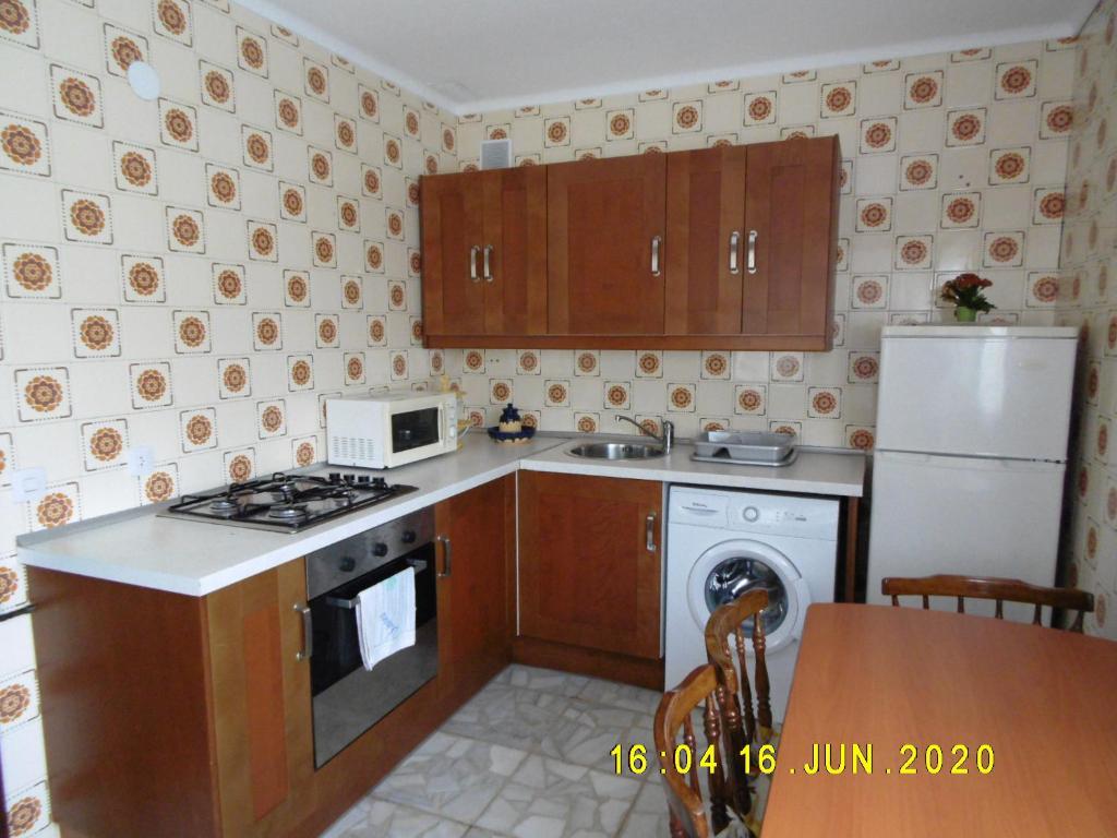 A kitchen or kitchenette at Apartamento Anjana