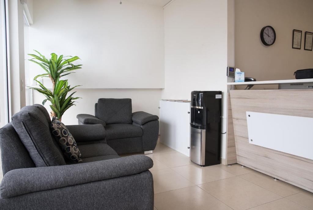 Posezení v ubytování Nova Hotel