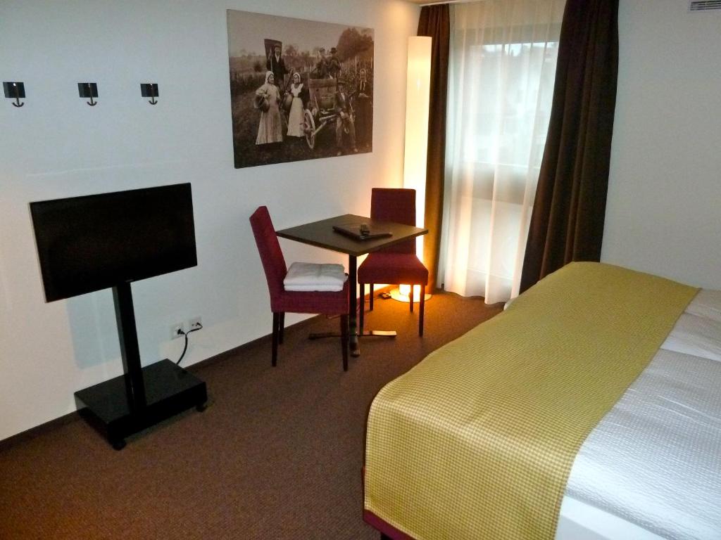 Postel nebo postele na pokoji v ubytování Gasthaus Sternen