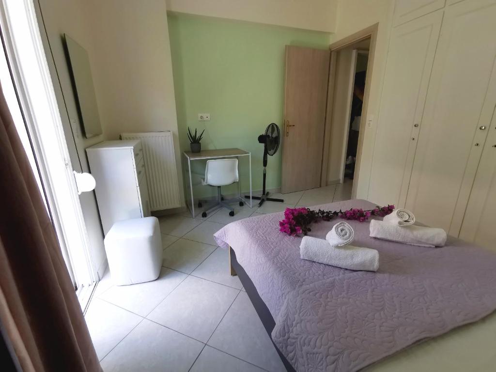 Posteľ alebo postele v izbe v ubytovaní Lefkada SunCentral Apartments