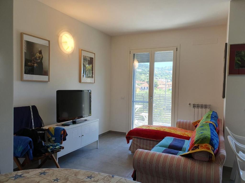 Televízia a/alebo spoločenská miestnosť v ubytovaní casa di clara