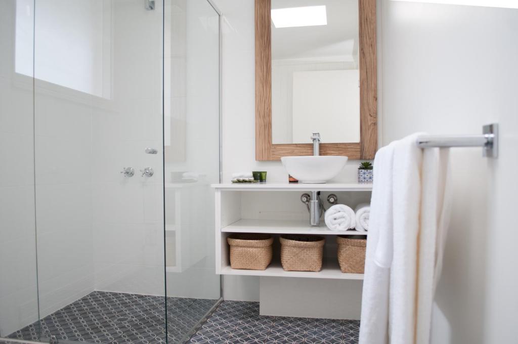 a bathroom with a sink and a shower at Anchor Geelong in Geelong