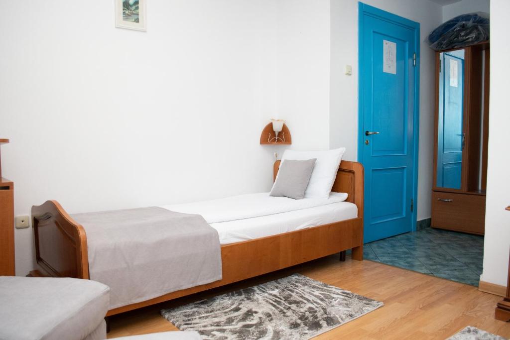 Postel nebo postele na pokoji v ubytování Motel Via Targu Mures