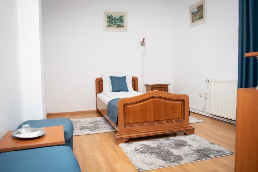Postel nebo postele na pokoji v ubytování Motel Via Targu Mures