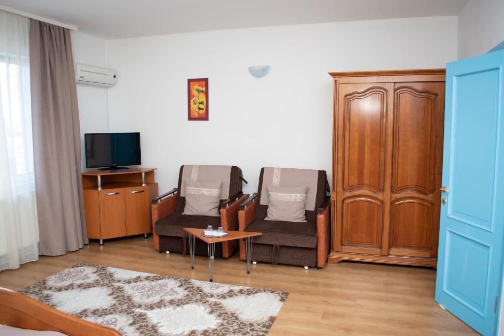 TV a/nebo společenská místnost v ubytování Motel Via Targu Mures
