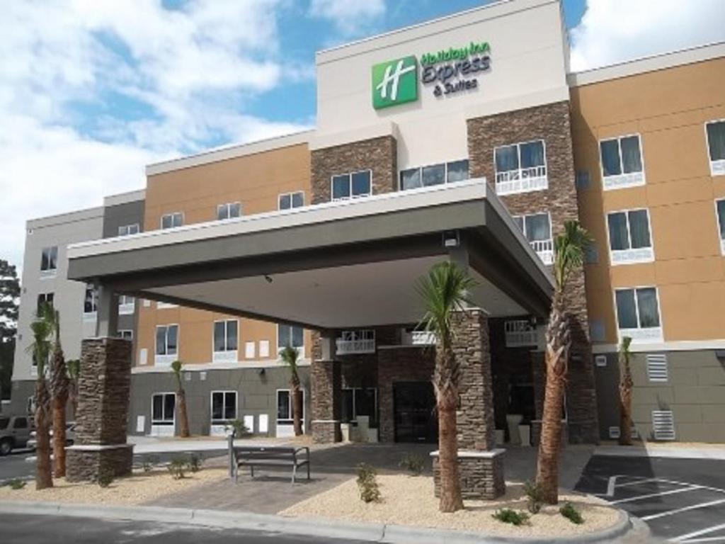 a rendering of the front of a hotel at Holiday Inn Express & Suites Southport - Oak Island Area, an IHG Hotel in Oak Island