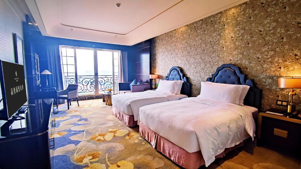 Postel nebo postele na pokoji v ubytování Chateau Star River Guangzhou-Chateau Star River Guangzhou-Trade Fair Shuttle Bus