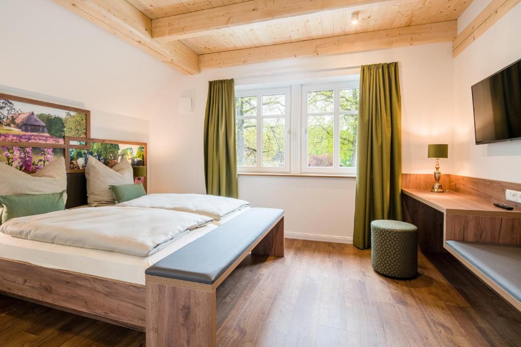 Postel nebo postele na pokoji v ubytování Heidjers Hus Undeloh