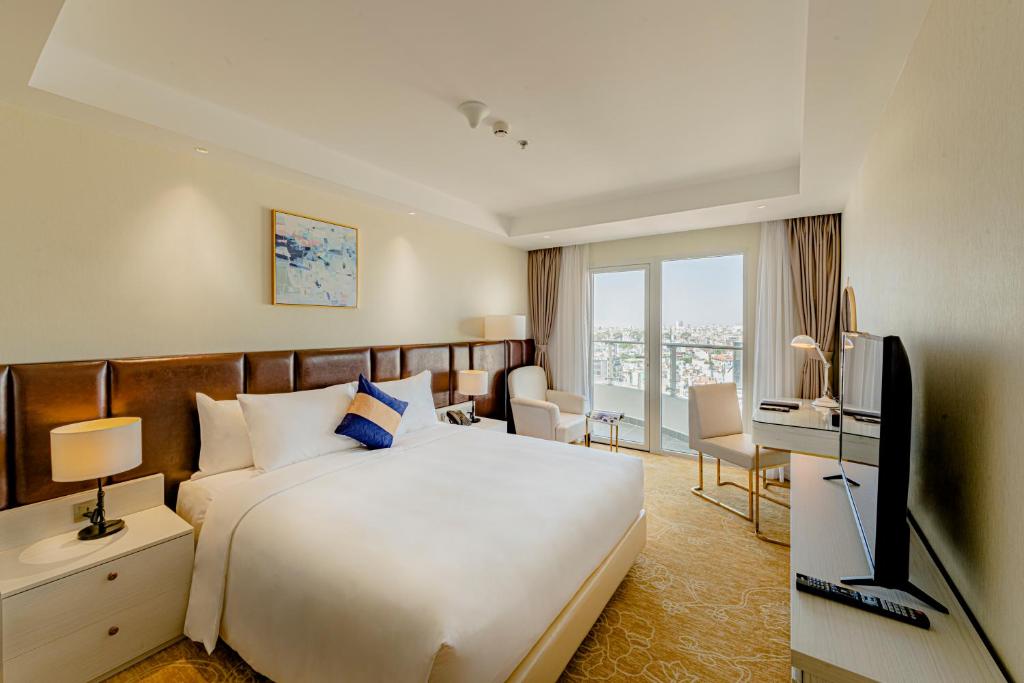 TV/trung tâm giải trí tại La Vela Saigon Hotel