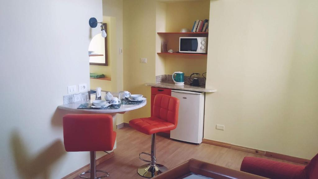 Kuchyň nebo kuchyňský kout v ubytování B&B Relax