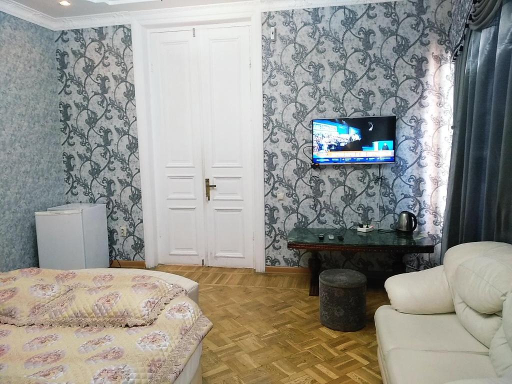 Postel nebo postele na pokoji v ubytování Hotel Edemi Castle