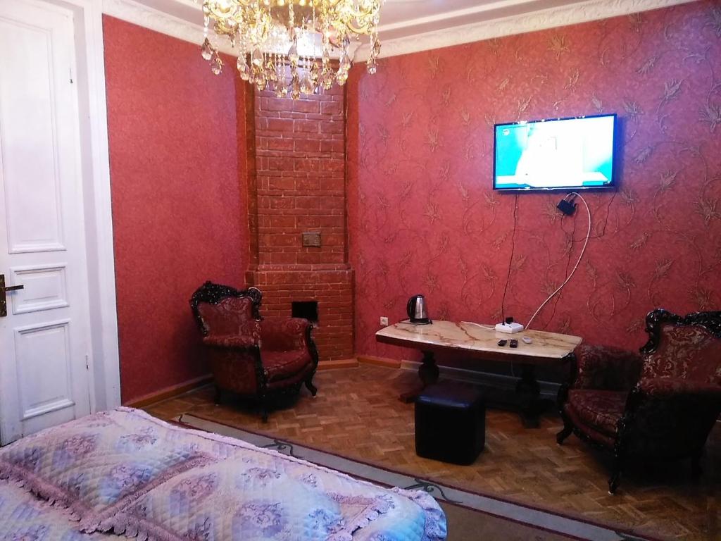 TV a/nebo společenská místnost v ubytování Hotel Edemi Castle