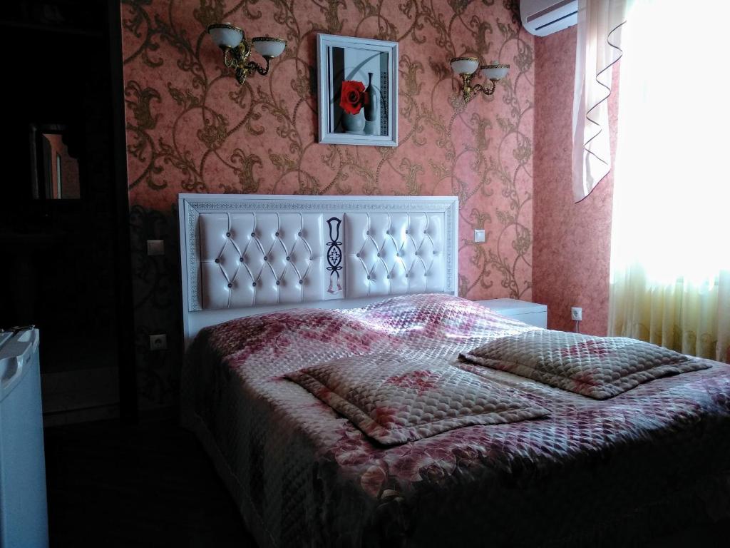 Postel nebo postele na pokoji v ubytování Hotel Edemi Castle