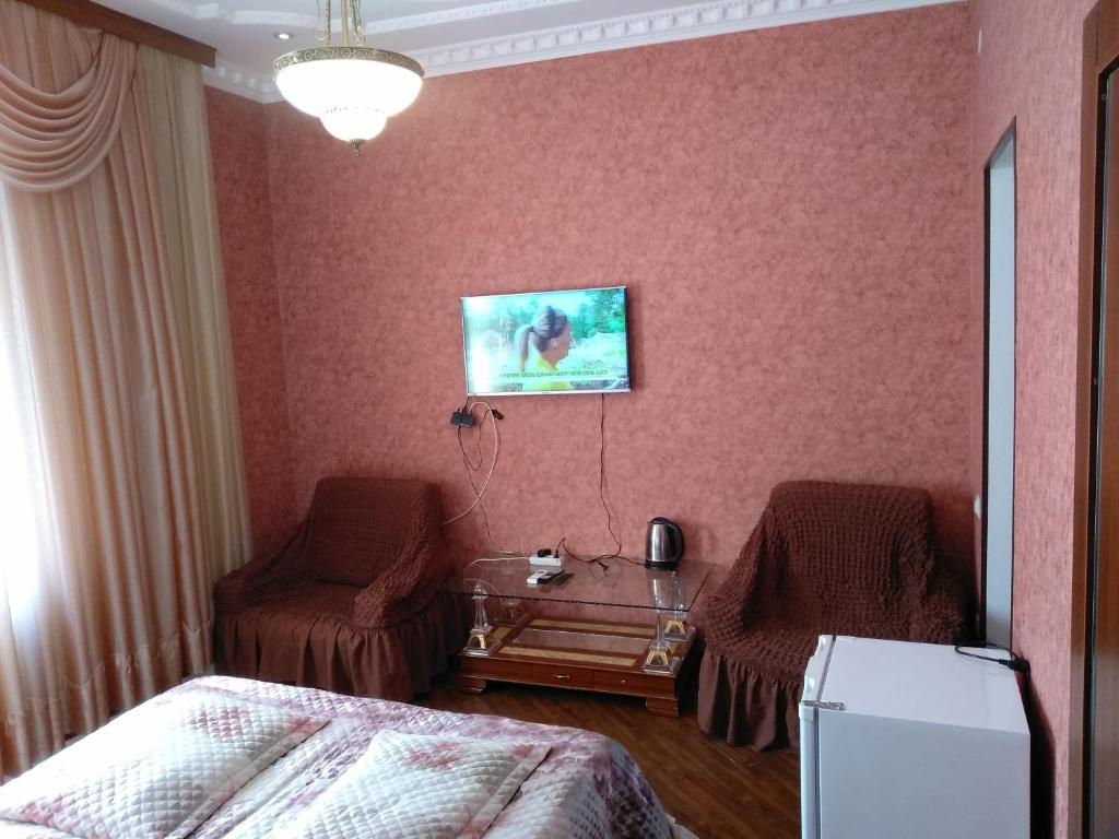 Postel nebo postele na pokoji v ubytování Hotel Edemi Castle