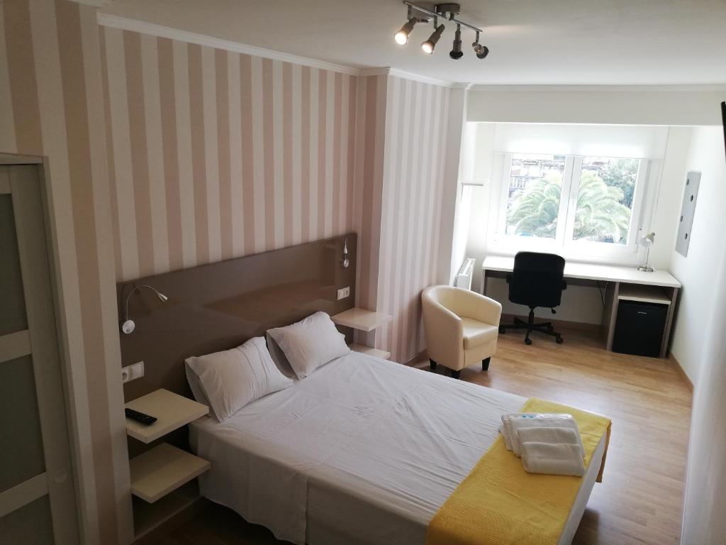 Posteľ alebo postele v izbe v ubytovaní Residencia Compostela