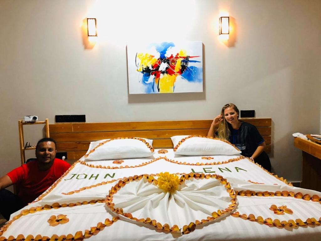 Postel nebo postele na pokoji v ubytování IRIS Beach Residence