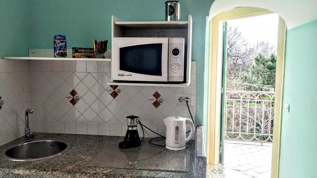 TV a/nebo společenská místnost v ubytování B&B Relax