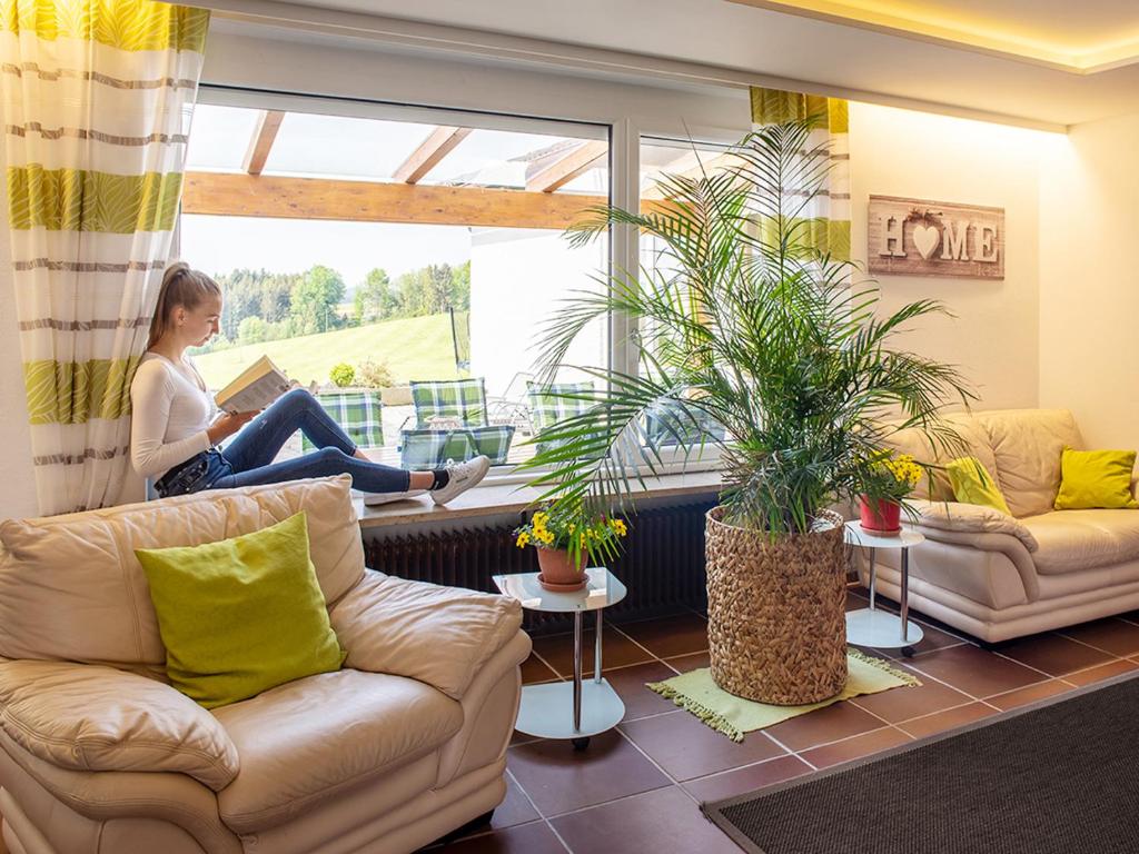Posedenie v ubytovaní Traumferienhaus XXL Ortner