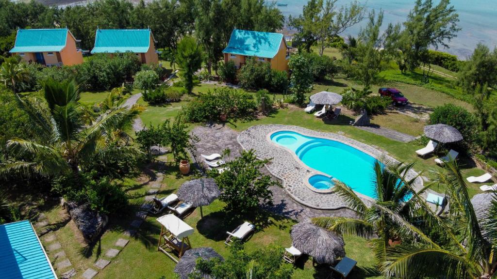 an aerial view of a resort with a swimming pool at La Belle Rodriguaise in Rodrigues Island
