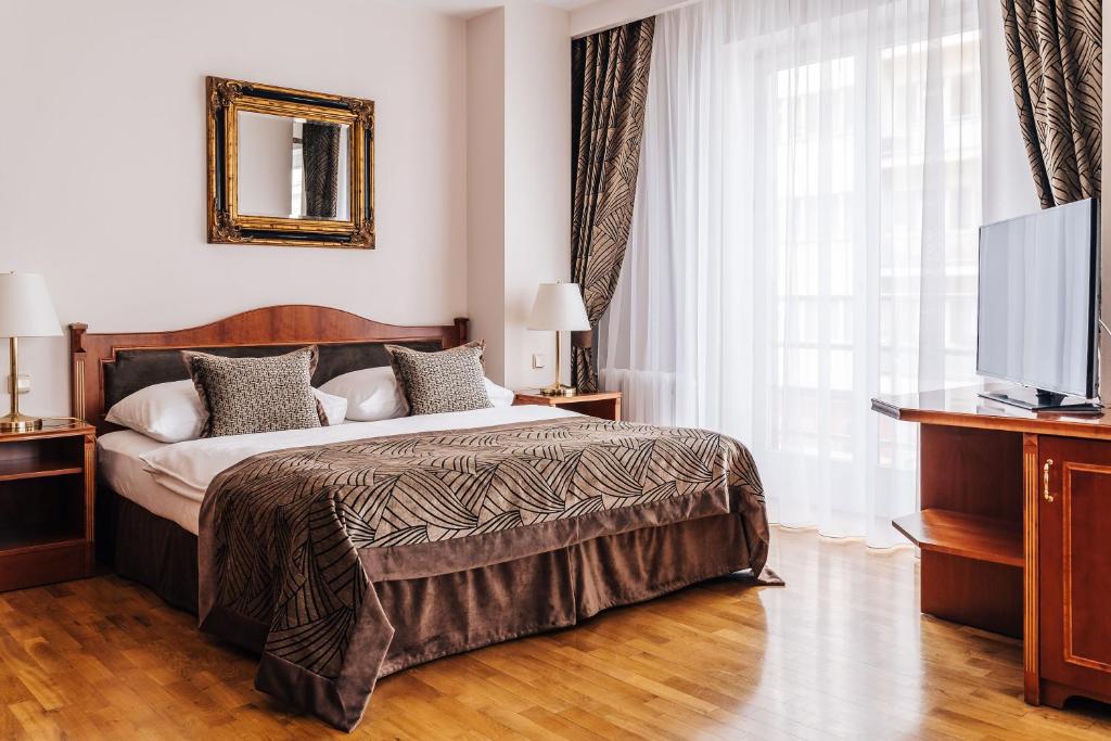 Postel nebo postele na pokoji v ubytování Belvedere