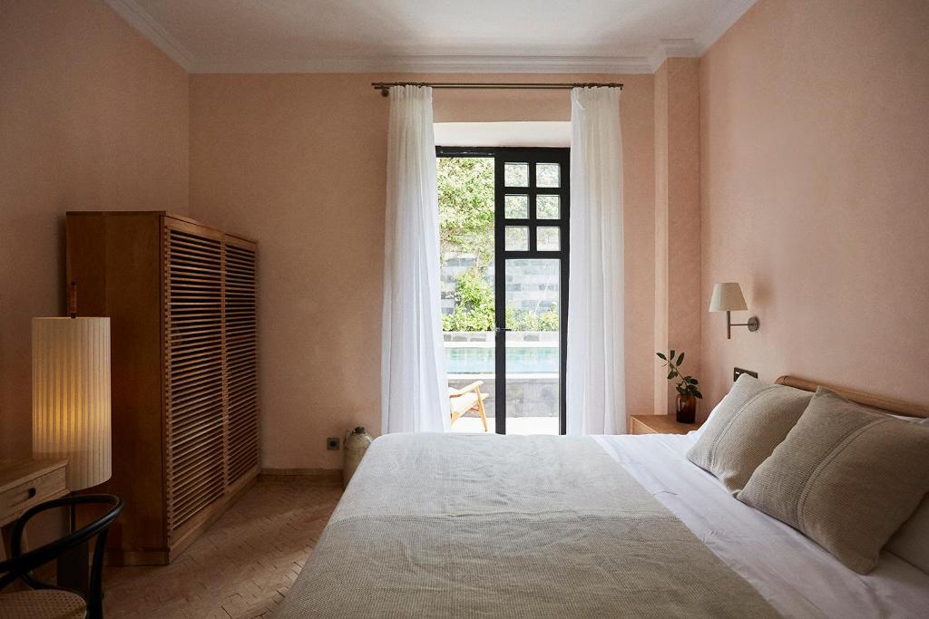 Postel nebo postele na pokoji v ubytování Boutique Hotel Mendi Argia
