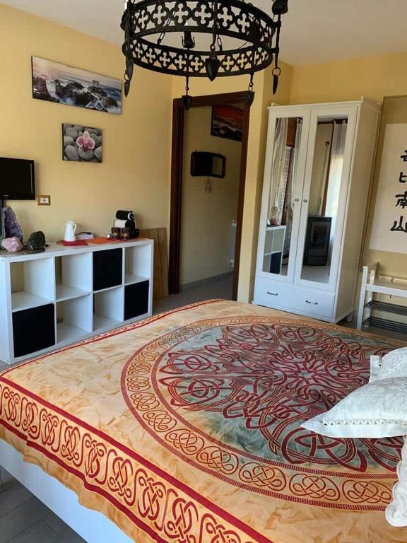 Postel nebo postele na pokoji v ubytování Lakshmi House