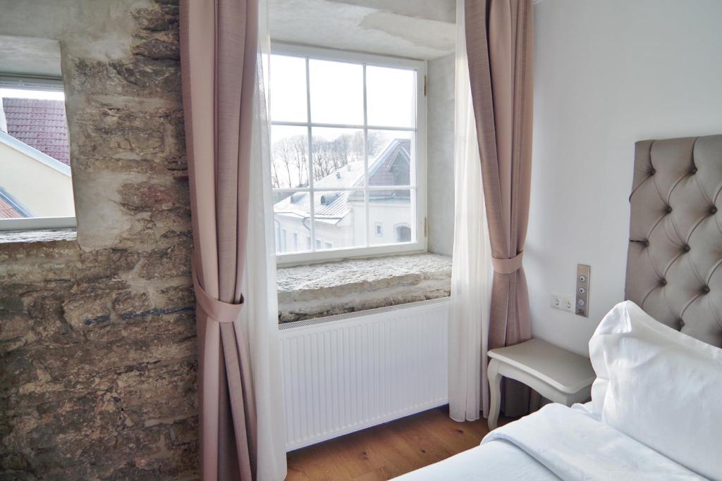 Postel nebo postele na pokoji v ubytování Hotel Regent Tallinn
