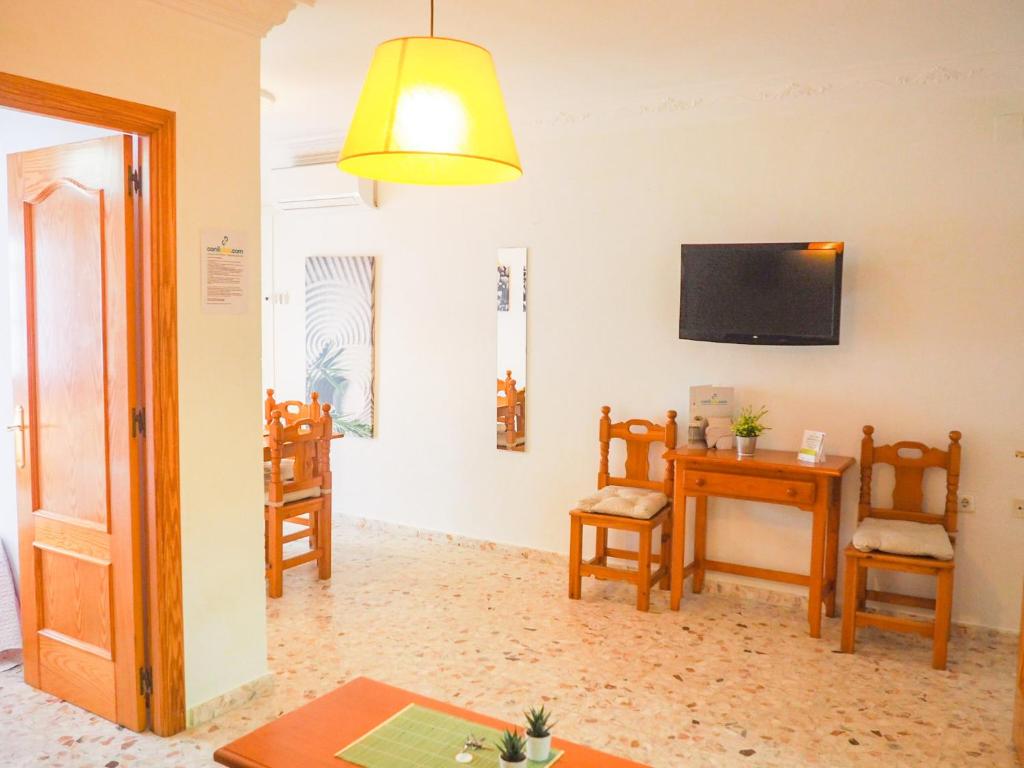 Televízia a/alebo spoločenská miestnosť v ubytovaní ConilPlus apartments AZORIN II